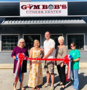 Chamber Hosts Ribbon Cutting for Gym Bob's Fitness Center: Pictured left to right- Chamber President Lisa Cripps, owners Sydney and Bobby Johnson, Chamber Director Suzanne Williams, Chamber Board Member Leigh Fuson