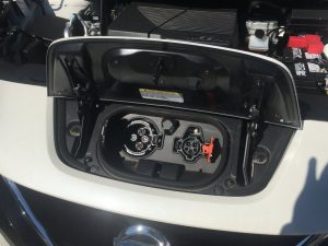 Photo shows electric charging ports in a Nissan Leaf which was brought to Smithville for a demonstration Monday