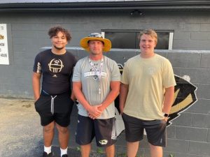 DCHS Football Region 3, Class 4A winners: Antwon McCoy (left) All Region 2nd Team, Tiger Coach Steve Trapp-Region Coach of the Year, and Ean Jones (right) All Region 1st Team