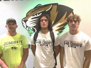 DCHS Tiger Coach Steve Trapp (left) earns Region 3,Class 4A Coach of Year Honor. Tiger Quarterback Axel Aldino (center) named Region Football MVP, and Tiger Wide Receiver Desmond Nokes (right) selected Region Offensive MVP