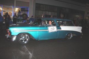 Sondja Mclaughlin wins 1st place for best antique car in the Alexandria Christmas parade for her 1956 Chevy Nomad