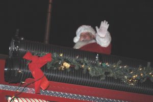 Santa is the star of the show at the Alexandria Christmas Parade Saturday night