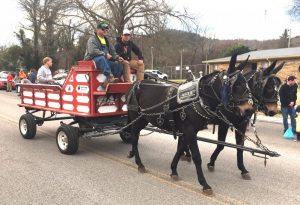 Donny Agee family takes 2nd place in antique category during Sunday's Liberty Christmas Parade