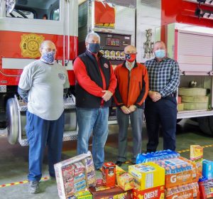 Officials with the Tennessee State Fire Marshal’s Office let local volunteer fire departments know how much they are appreciated on Monday by delivering snacks to them. Pictured: DeKalb Fire Captain Michael Lawrence; Gary Farley, Assistant Commissioner for the State Fire Marshal’s Office, County Mayor Tim Stribling, and DeKalb Fire Chief Donny Green