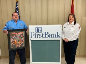 The Liberty Station of the DeKalb Fire Department was honored with the First Bank Station of the Year Award Saturday night. Lt. Kristie Johnson (right) presented the award