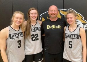 Kadee Ferrell (second from left) of the DCHS Lady Tiger basketball team made the 1st Team All-District and the All-District Defensive Team. Ella VanVranken (far right) was named the District’s Freshman of the Year and she made the 3rd Team All-District. Megan Cantrell (far left) and Watertown’s Brittni Allison shared the honor of being the District’s Most Improved Players of the Year. Cantrell, Ferrell, and VanVranken are pictured here with Lady Tiger Coach Danny Fish