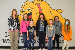 DeKalb West Students of the Month for March from 3rd-5th grades are: (front row) Averie Winchester, Emily Roberts, Miley Tays (Back row) Mrs. Farler, Kate Pistole, Kawasi Troyer and Jaiden Tramel.