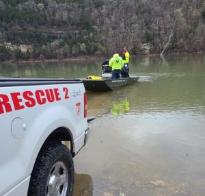 Smithville-DeKalb County Rescue Squad conducts rope rescue of a woman who slid down a steep hill near Aaron Webb Road and Potts Camp Road Saturday afternoon. The Rescue Squad launched a boat at the lake to get to the foot of the hill and used ropes to climb the bluff to where the woman was trapped