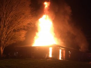 An early morning fire today (Sunday) destroyed two dwellings at a Smithville Housing Authority duplex on Jackson Street resulting in one woman suffering burns. Two dogs perished in the blaze at one of the homes but firefighters were able to rescue a cat at the other residence.