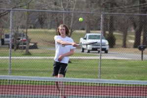 Both the Boys and Girls DCHS tennis teams won their matches against White County at home on Tuesday afternoon. The boys won their match 7 – 2 while the girls won 6 – 3. Tennis matches consist of six singles matches and three doubles matches. Ian Paladino shown here won 8-0