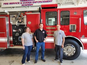 Three members of the DeKalb County Fire Department, Faith Caplinger Ricketts, Cody Herman, and Kyle Hovey graduated Saturday and Sunday from the Tennessee Fire Service and Codes Enforcement Training Academy's Live Burn Firefighter I class.