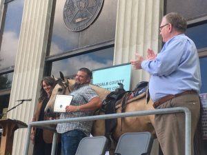 DeKalb Recovery Court Graduate Chad Cantrell’s horse “Buck” was singled out for special recognition during the Recovery Court graduation program Wednesday outside the courthouse. According to Coordinator Kate Arnold, “Buck” has stuck with Chad through his struggles and Chad brought “Buck” to many of the drive through court sessions and even a Christmas event.