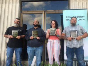 A celebration was held Wednesday afternoon for four adults who have graduated from the DeKalb County Recovery Court Program and are on the path to sober living. The program for recovery court graduates (Pictured left to right) Brandon Bohannon, Jermaica League, Amber Mctaggart, and Chad Cantrell was held on the east side steps of the DeKalb County Courthouse in conjunction with National Recovery Court Month in May. Each of the graduates received a plaque and a $50 check from General Sessions and Juvenile Court Judge Bratten Cook, II in recognition for their accomplishments.