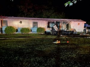Two people escaped unharmed from a burning mobile home early this morning (Friday). County Firefighters were summoned to the residence of Diane Roller at 843 Old West Point Road at 12:52 a.m. and found the front porch ablaze. The fire had also penetrated to the inside of the trailer. They quickly knocked down the flames with moderate damage to the home although it is currently not livable.