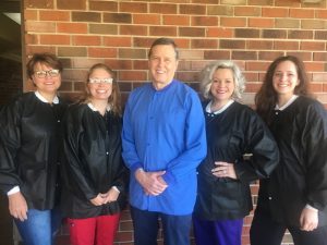 Longtime dentist Dr. Cliff Duke, who had been in practice since 1979, retired in June completing 42 years of service to this community. Pictured here with his staff left to right: Gena Cripps, Shawnnie Davis, Dr. Duke, Danielle Reynolds, and Rachel Hendrixson