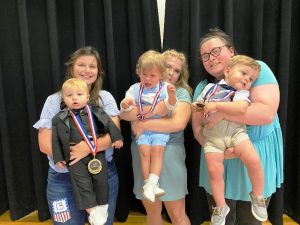 Boys 13-24 months: Saige Tyreise Reeder (center) was crowned King. He is the 17 month old son of Reagan Patton and Deshon Reeder of Smithville. He also won for Prettiest Hair, Eyes, and Attire. 1st runner-up: Corbin James Claude (right) of Dowelltown, son of Bailey Pack and Robert Claude. 2nd runner-up and Most Photogenic: Sawyer Cordell Oyster (left), 13 month old son of Coleman and Morgan Oyster of Liberty.