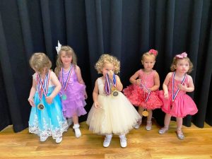 Miss Jamboree Pageant girls 25-48 months: Queen Briar Rose Kilgore (center), the 2 year old daughter of Clay and Mariah Kilgore of Smithville. She also won for Most Photogenic and Prettiest Eyes and Hair. 1st runner-up: Blakelyn Emerie Cripps (2nd from left), 3 year old daughter of Corey and Kami Cripps of Smithville. 2nd runner-up: Peyton Rae Shepherd (2nd from right), 2 year old daughter of Jason and Ashley Shepherd of Smithville. 3rd runner-up and Prettiest Attire: Kathryn Ann Williams (far left), 3 year old daughter of Dillon and Hailey Williams of Alexandria. 4th runner-up: Serenity Carmen Tiner (far right), 30 month old daughter of Billy and Stephanie Tiner of Smithville.