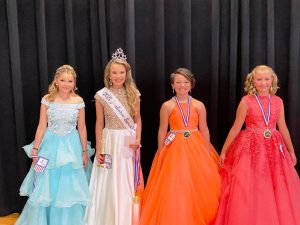 Miss Jamboree Pageant 11-13 age division: 12 year old Kate Elyse Gribble won the crown (2nd from left) . She is the daughter of Darrell and Jennifer Gribble of Morrison. Kate also took home awards for Most Photogenic and Prettiest Eyes, Hair and Attire. 11 year old Karah Jo Ford (2nd from right) of Smithville was 1st runner-up. She is the daughter of Amanda Ford and Hector O-Roscoe. Haley England (far left)was 2nd runner-up. She is the 12 year old daughter of Robert and Stephanie England of Smithville. Third runner-up went to 11 year old Jessa Nevaeh Sanders (far right), daughter of James and Misti Sanders of Smithville.