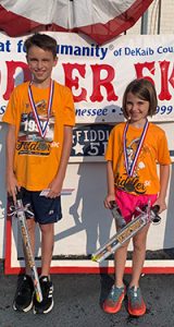 One-Mile Fun Run (age 12 and younger) winners: TOP MALE: Ewan England at 8:14 seconds and TOP FEMALE: Nola England at 8:43 seconds (Photo by Luton’s Media)