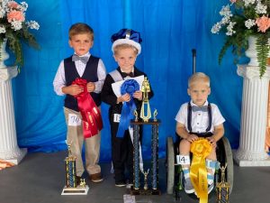 DeKalb Fair Little Mister 2021: Left to right: 1st Runner-Up and Most Photogenic- Maddux Hale, 4 year old son of Kimberly and Austin Hale of Smithville; Little Mister- Colton Graham Duke, 5 year old son of John and Whitney Duke of Smithville; and 2nd Runner-Up Jordan Isaiah Wright, 5 year old son of Nick and Mikayla Wright of Smithville