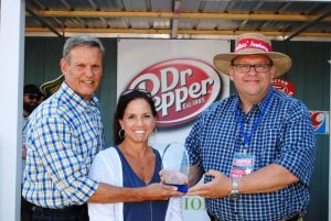 Governor Bill Lee and wife wife Maria presented an award on behalf of the Jamboree to Jack Barton, a former Fiddlers Jamboree President and Coordinator for his years of dedicated service.