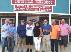 Several former Fiddlers Jamboree emcees were invited back and were on hand Friday to take part in the first day of the 50th festival including: Pictured left to right: Andy Johnston, Louise Williams- Owen, Bill Lee Austin, Tom Duggin-current emcee), Gayla Hendrix, Ralph Vaughn, Oscar Boyd, and Alex Woodward (current emcee)