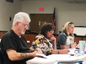 County Budget Committee members Jerry Adcock, Julie Young, and Jenny Trapp