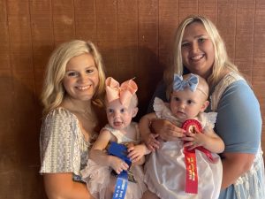 DeKalb Fair Baby Show: Girls (10-12 months) Winner: Everleigh Hope Wright (left), 10 month old daughter of Nick and MiKayla Wright of Smithville. Runner-up: Braylee Renee Ball (right), 10 month old daughter of Lane and Haley Ball of Smithville.