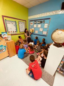 1st grade teacher Leah Magness reading to her class