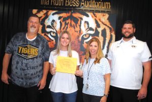 DeKalb County High School has begun a monthly observance to recognize a teacher, student, and parent or guardian of the month and the first recipients were honored Friday morning. Pictured left to right: DCHS Principal Bruce Curtis, Student of the Month Ellie Webb, and Assistant Principals Jenny Norris and Thomas Cagle