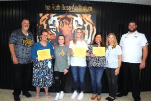 DeKalb County High School has begun a monthly observance to recognize a teacher, student, and parent or guardian of the month and the first recipients were honored Friday morning. Pictured left to right: DCHS Principal Bruce Curtis, Guardian of the Month Joann Meece and her granddaughter Arianna Barnwell, Student of the Month Ellie Webb, Teacher of the Month Sonja House, and Assistant Principals Jenny Norris and Thomas Cagle