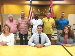 Director of Schools Patrick Cripps and the DeKalb County Board of Education. Seated left to right- 4th District member Kate Miller, Director Patrick Cripps, 5th District member Jamie Cripps. Standing left to right- 1st District member Danny Parkerson, 2nd District member Alan Hayes, 7th District member and Chairman Shaun Tubbs, 3rd District member Jim Beshearse, and 6th District member Jason Miller