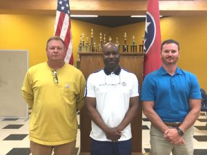 Seventh District member Shaun Tubbs (center) was elected Thursday night to serve as chairman of the DeKalb County Board of Education for the next twelve months. He will succeed First District member Danny Parkerson who has served as chairman for the past two years. Parkerson will remain a member of the board. Meanwhile, Third district member Jim Beshearse (left) was elected Vice Chairman of the Board while Sixth District member Jason Miller (right) will serve as the board’s Tennessee Legislative Network (TLN) representative.