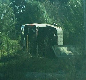 2000 GMC Sierra driven by 64 year old George Nixon. The impact caused Nixon to run off the road to the right and then hit a ditch before overturning several times. Both Nixon and his passenger, 64 year old Joyce Nixon were injured.