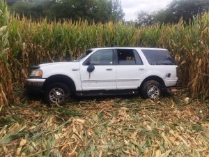2001 Ford Expedition driven by 24 year old Angela Acuna comes to rest in a cornfield off Highway 53 (Woodbury Highway) Friday afternoon
