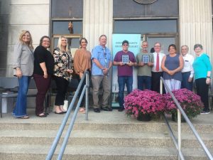 (DeKalb Recovery Court Team Members pictured left to right: Rhonda Tiefenauer- Recovery Court Case Manager, Allison West-Assistant Public Defender, Clara Knowles-PSI Probation; Kate Arnold-Coordinator; Larry Latzman Certified Peer Support; graduates Michael Powell and Larry Murphy, Judge Bratten H. Cook, II, Local attorney and Smithville Municipal Judge Gayla Hendrix, and John and Kay Quintero with Haven of Hope)