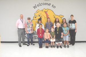 Pictured first row left to right are Jaritzy Camacho, Avaleigh Haddock, Zalie Hale, Lucas Yancey, and Paola Aguillar. Second row left to right are Assistant Principal Joey Agee, Landon Ford, Kayleigh Ramirezy, Autumn Crook, Izzy Hendrixson, Kayley Womack, and Principal Sabrina Farler.