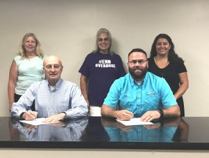 County Mayor Tim Stribling and Smithville Mayor Josh Miller recently signed a proclamation designating September as Suicide Prevention Month in DeKalb County and Smithville. Jennifer Matthews (standing far right) and Lisa Cripps (standing center) of the DeKalb Prevention Coalition and Kristi Paling, Regional Coordinator at the Tennessee Commission on Children and Youth (standing far left) joined Mayors Stribling and Miller for the signing.