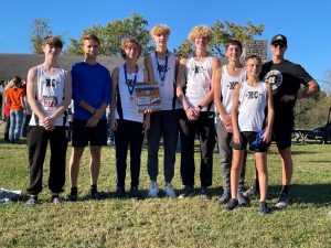The DeKalb County Boys Cross Country Team made history finishing 4th at the TSSAA 4A/AA regional Race. The fourth place finish earned the boys team a berth to the State Championship in Hendersonville, TN on Friday, November 5th. Pictured from left to right: Andrew Tramel, Ian Colwell, Cooper Brown, Aaron Gottlied, Kaleb Spears, Caleb Gray, Cale Brown, and Coach Paris Rabbidou.