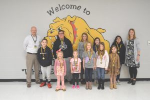 DWS November Students of the Month pictured front row left to right are Christian Cripps, Haddleigh Harvey, Anna Cripps, Kayla Sebolt, Riley Martin, and Annabella Ray. Back row left to right are Assistant Principal Joey Agee, Ethan Reynolds, Miah Johnson, Kaitlyn Swearinger, Jaretzy Aguilar, and Principal Sabrina Farler.