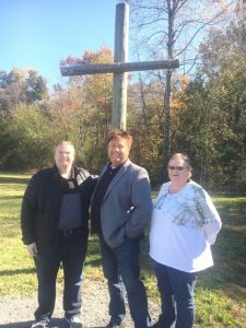 “Cries From The Cross” Hits the Airwaves Starting Today (February 1) “Cries from the Cross” was recently composed as a collaborative work of local talent Vonda Brown (right) and professional Southern Gospel singer/songwriter Johnathan Bond (middle) of Young Harmony. The Smithville First Free Will Baptist Church served as the onsite location for the music video shoot in December. Pastor Andy Patterson (left)