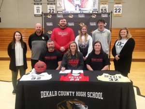 DCHS Lady Tiger Kadee Ferrell, a senior and member of the 1,000 point club, signed a letter of intent Tuesday with Bryan College in Dayton, Tennessee to play basketball for the Lady Lions next season. Joining her at the signing pictured here seated left to right are: Anthony Ferrell (father), Kadee Ferrell, Trena Ferrell (mother). Standing left to right: Assistant DCHS Lady Tiger Coach Maddison Parsley, DCHS Lady Tiger Coach Danny Fish, Bryan College Lady Lions Coach Bryon Lawhon, Assistant Lady Lions Coach Alex McIntosh; AAU Coach Matt Ferrell, and Rayanna Chapman