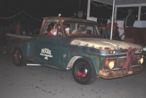 For best vintage automobiles at the Alexandria Christmas Parade, Mike Stallard and Justin Paschal tied for 1st place. Paschal had a 1964 Chevy C10 shown here