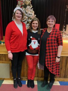DeKalb Middle School music teacher Erica Birmingham (left) pictured here with Assistant DMS Principal Anita Puckett, and Birmingham’s mother and DMS teacher Kelly Jo Birmingham.