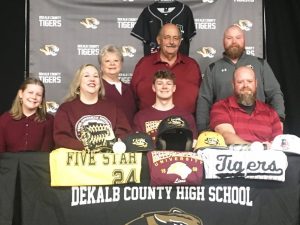 Patrick Cantrell, a senior and ace pitcher for the DCHS Tiger baseball team signed a letter of intent with Freed-Hardeman University to play collegiate ball for the Lions after he graduates. Joining him for the signing were members of his family and coach pictured here: Seated left to right: Kenzie Cantrell (sister), Sabrina Cantrell (mother), Patrick Cantrell, and Aaron Cantrell (father). Back Road left to right Brenda and Boyd Cantrell (grandparents) and DCHS Tiger Coach Tad Webb.