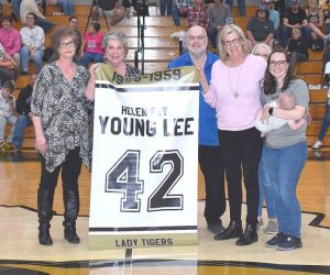 Two DeKalb County High School Basketball legends were honored in December during the 1st ever DCHS Basketball Alumni Homecoming Week. The observance for 1970’s Tiger star Rickey Usrey and the late 1959 Lady Tiger sensation Helen Lee was held as DCHS hosted Stone Memorial. Members of Lee’s family on hand for her tribute were (some of whom pictured here in no particular order): Benjamin Felton (grandson), Carolyn Whitley (sister), Judy Rogers (sister), Ronny Young (nephew) and wife Nancy, Aaron Young (grandnephew), and Alyssa Leslie (Grandniece). (Photo provided by Chris Tramel)