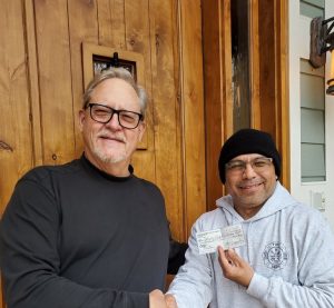 Pictured are (left) Pete Siggelko (Mountain Harbour Property Owners Association) and (right) Gelasio “Marco” Chacon (Station Commander of the Johnson’s Chapel Station