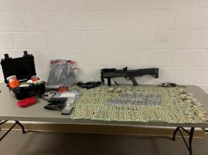 A motorist pulled over Tuesday night, January 4 by a sheriff’s department deputy for a light law violation was found with homemade explosives (bomb), a large amount of cash, methamphetamine, marijuana, shotgun, and a revolver.