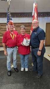 The DeKalb County Veterans Services Office recently was honored to present the Korean Ambassador for Peace Medal to the family of 1st Sgt Chester Holmes United States Marine Corps (RET). Presenting was Bill Rutherford. County Veteran Service Officer. Accepting the Medal on behalf of 1stSgt Holmes, were Patsy Russel (daughter) and William Russell (son-in-law).