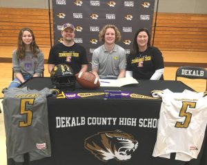 DCHS Tiger Football Senior Isaac Knowles signed a letter of intent Wednesday, February 2 with Tennessee Tech University to play for the Golden Eagles starting next year. He was joined at the signing at DCHS by his family pictured here including sister, Katherine, father Jared, and mother Karen Knowles